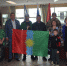 Группа людей с флагом внутри здания - Bratsk.Irk.Today