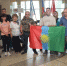 Группа людей с флагами в помещении - Bratsk.Irk.Today