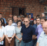 Группа людей перед кирпичным зданием. - Bratsk.Irk.Today
